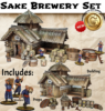 Painted 28mm scale 3D printed Japanese sake brewery set including a traditional building with a thatched roof, worker miniatures, and brewing props like barrels, vats, and tools for tabletop wargaming.