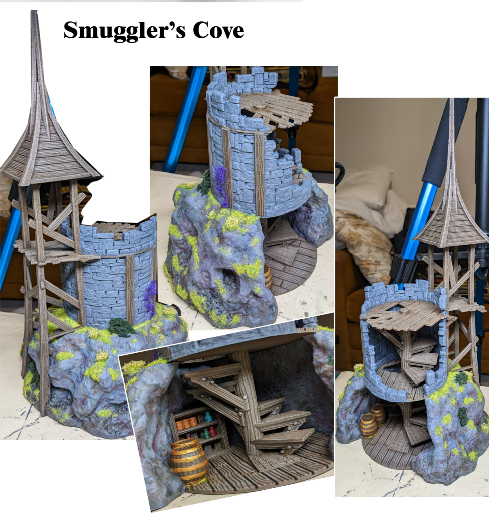 A painted 3D print of the Smuggler's Cove terrain, featuring a ruined gray stone tower built upon a mossy rock cliff. A wooden scaffolding and a pointed wooden roof adorn the tower. A hidden cave in the cliff reveals a detailed interior with wooden stairs, shelves of bottles, and a barrel.