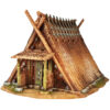 A 28mm scale 3D printed model of a Chigi-Minka, an ancient Japanese dwelling. The structure is characterized by a steep A-frame thatched roof topped with prominent crossed wooden finials (Chigi) and horizontal logs (Katsuogi). It features a sheltered entrance with timber pillars, rustic wooden doors, and a stone-lined foundation, reflecting a high-status or spiritually significant historical residence.